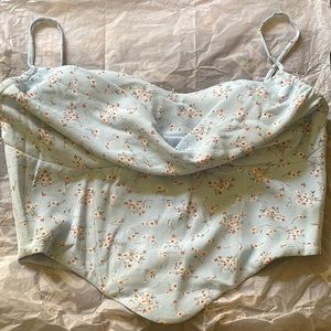 This is a never worn, cute corset too from the brand Miss circle.